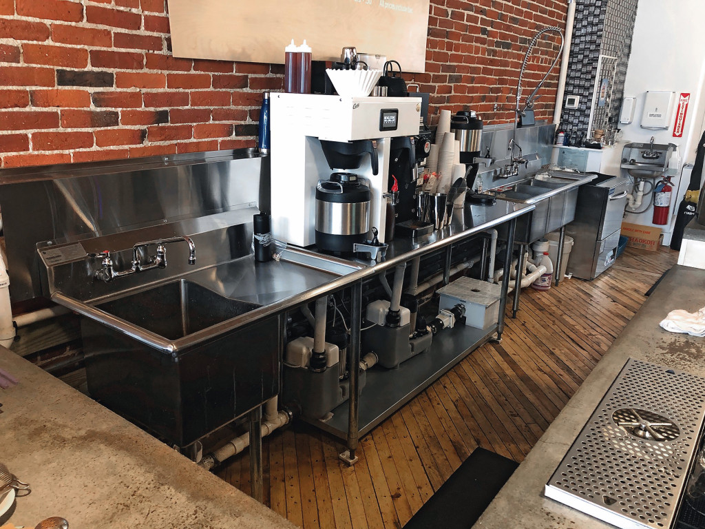 Coffee shop owner overcomes “nightmare” application with Sanicom1 Drain Pumps