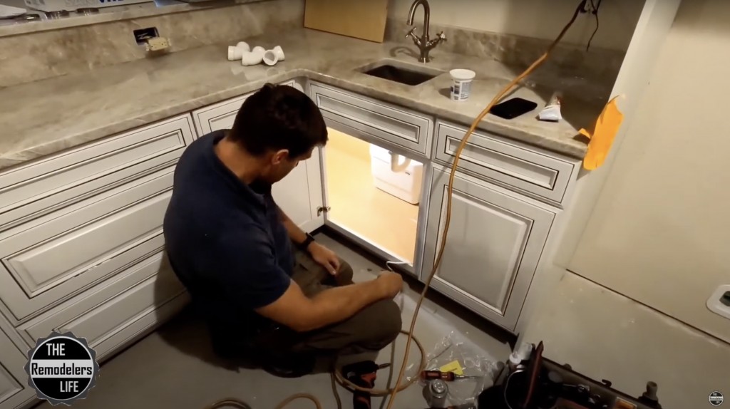 Building contractor, plumber uses a small, but powerful drain pump to overcome a big plumbing challenge