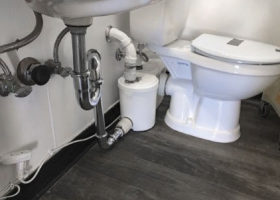 Saniflo’s Sanibest Pro heavy-duty grinder pump chosen as a cost-saving solution for unusual floating bathroom application